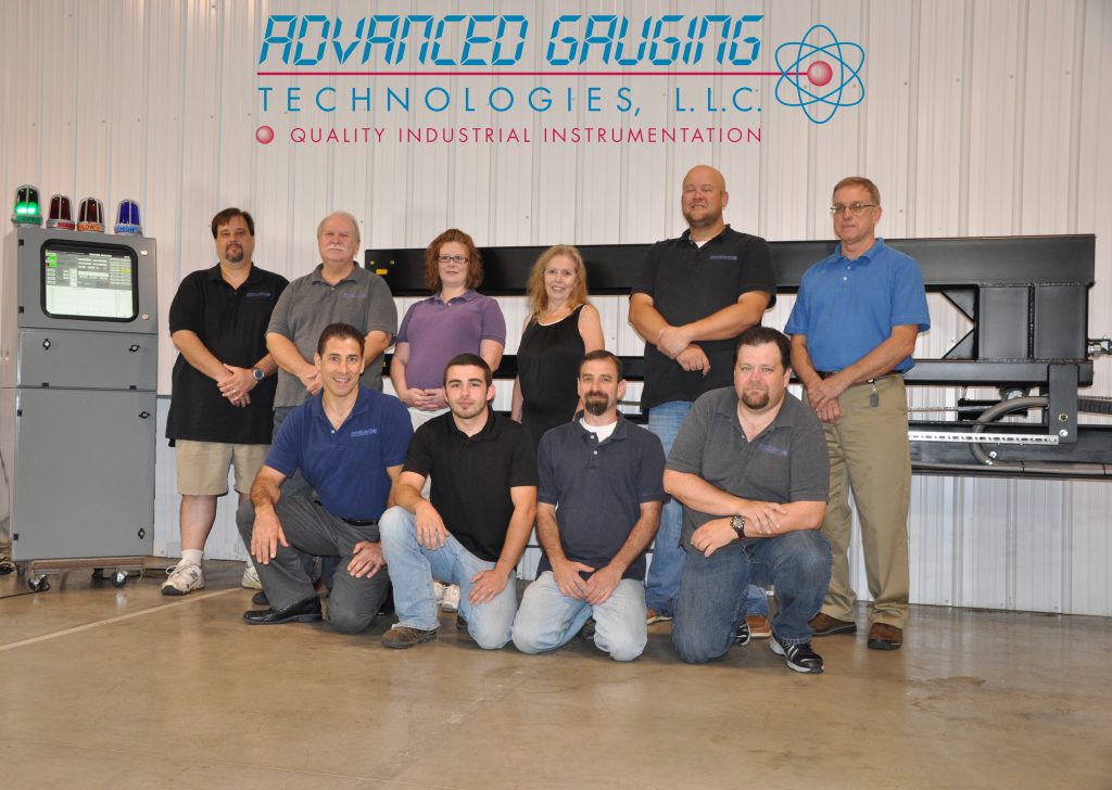 The AGT800 Laser Thickness Gauge Development Team Standing (from left to right): Todd Allen, Steve Venters, Sarah Hess, Coralie Cook, Craig Walkup and Jim Russell Kneeling (from left to right): Scott Cook, Rob Cook, Bob Cook and John Fearing Not pictured: Michael Bertin, Ph.D. 